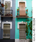 Seville Macarena barrio facades in Sevilla Spain. Стоковое фото, агентство Ingram Publishing / Фотобанк Лори