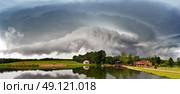 Summer storm landscape. Dramatic cloudy sky. Hurricane and rain in Belarus. Стоковое фото, агентство Ingram Publishing / Фотобанк Лори