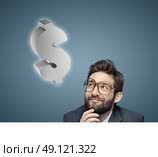 Conceptual portrait of a young nerdy businessman. Стоковое фото, агентство Ingram Publishing / Фотобанк Лори