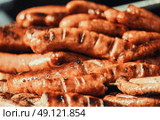 Sausages On Barbecue Grill. Стоковое фото, агентство Ingram Publishing / Фотобанк Лори