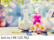 Spa and massage setting with  frangipany flowers for Healthy  treatments at spring or summer nature background. Стоковое фото, агентство Ingram Publishing / Фотобанк Лори