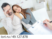 Stressed man being questioned. Стоковое фото, агентство Ingram Publishing / Фотобанк Лори