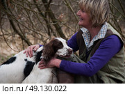 Portrait of a woman and her two spaniels. Стоковое фото, агентство Ingram Publishing / Фотобанк Лори