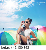 Adorable young woman taking a sunbath. Стоковое фото, агентство Ingram Publishing / Фотобанк Лори