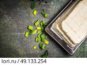 Diced Silken tofu on rustic background, top view, close up. Стоковое фото, агентство Ingram Publishing / Фотобанк Лори