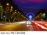 Champs Elysees in Paris and Concorde sunset at France. Стоковое фото, агентство Ingram Publishing / Фотобанк Лори