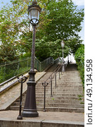 Paris Montmartre stairway stairs to reach Sacre Coeur. Стоковое фото, агентство Ingram Publishing / Фотобанк Лори