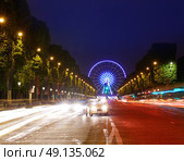Champs Elysees in Paris and Concorde sunset at France. Стоковое фото, агентство Ingram Publishing / Фотобанк Лори