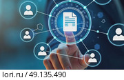 Businessman pointing at a document icon on a digital interface with blue and white elements, surrounded modern futuristic hi-tech business financial interface. Стоковое AI-видео, аниматор Sergey Grishin / Фотобанк Лори
