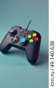 A pixel-art inspired 3D game controller icon with retro colors, slight tilt for dynamic perspective, nostalgic vibe. Стоковое AI-видео, аниматор Sergey Grishin / Фотобанк Лори