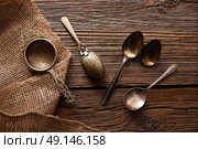 Vintage retro tea Strainers silver brass on wooden background. Стоковое фото, агентство Ingram Publishing / Фотобанк Лори