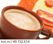 Cup of cappuccino coffee with cake. Стоковое фото, агентство Ingram Publishing / Фотобанк Лори