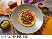 Humus with marinated tuna Moroccan recipe on wooden table. Стоковое фото, агентство Ingram Publishing / Фотобанк Лори