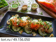 Wakame algae salad with salmon wasabi sesame and sprouts. Стоковое фото, агентство Ingram Publishing / Фотобанк Лори