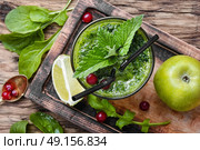 Freshly spinach smoothie. Blended green smoothie drink with spinach and. Стоковое фото, агентство Ingram Publishing / Фотобанк Лори