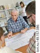 Let’s take a look at these plans. Стоковое фото, агентство Ingram Publishing / Фотобанк Лори