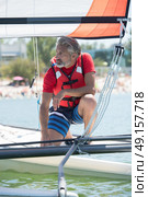 professional waterman training on lake with catamaran. Стоковое фото, агентство Ingram Publishing / Фотобанк Лори