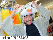 young handsome man disguised as a cute sweet little bunny. Стоковое фото, агентство Ingram Publishing / Фотобанк Лори