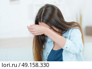 sad woman in the room. Стоковое фото, агентство Ingram Publishing / Фотобанк Лори