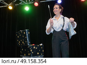 beautiful young magician with a magic wand. Стоковое фото, агентство Ingram Publishing / Фотобанк Лори