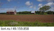 Barns on a farm, Kensington, Prince Edward Island, Canada. Стоковое фото, агентство Ingram Publishing / Фотобанк Лори