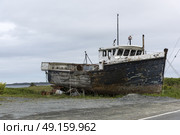 Abandoned fishing trawler at harbor, Marie Joseph, Nova Scotia, Canada. Стоковое фото, агентство Ingram Publishing / Фотобанк Лори
