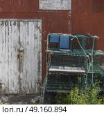 Lobster traps at fishing shed in harbor, West Dover, Halifax, Nova Scotia, Canada. Стоковое фото, агентство Ingram Publishing / Фотобанк Лори