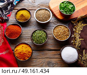 Indian cuisine spices mix as coriander curry  cardamom cumin. Стоковое фото, агентство Ingram Publishing / Фотобанк Лори