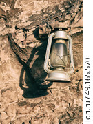 in the rock desert of jordan an antique old fashioned lamp isolated. Стоковое фото, агентство Ingram Publishing / Фотобанк Лори