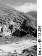 football field  gorge and canyon the deep cloudy sky     in oman the  old   mountain . Стоковое фото, агентство Ingram Publishing / Фотобанк Лори