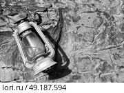 in the rock desert of jordan an antique old fashioned lamp isolated. Стоковое фото, агентство Ingram Publishing / Фотобанк Лори