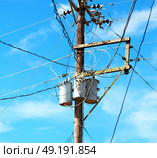 blur  in  philippines   a electric pole with transformer and wire  the cloudy sky. Стоковое фото, агентство Ingram Publishing / Фотобанк Лори