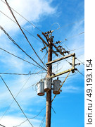 blur  in  philippines   a electric pole with transformer and wire  the cloudy sky. Стоковое фото, агентство Ingram Publishing / Фотобанк Лори