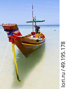 prow thailand  in  kho tao bay asia isle blue clean water    pirogue   and south china sea . Стоковое фото, агентство Ingram Publishing / Фотобанк Лори