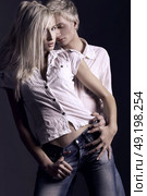 Handsome guy seducing his beloved girlfriend. Стоковое фото, агентство Ingram Publishing / Фотобанк Лори