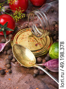 Homemade pickle tomato. Tomatoes, cooked with pepperand garlic for the preservation. Стоковое фото, агентство Ingram Publishing / Фотобанк Лори