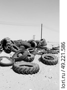 in oman old tires and desert  rubbish dump. Стоковое фото, агентство Ingram Publishing / Фотобанк Лори
