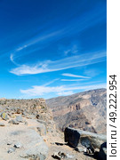 gorge and canyon the deep cloudy sky   in oman the old  mountain . Стоковое фото, агентство Ingram Publishing / Фотобанк Лори
