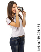 Young travelling girl isolated on white. Стоковое фото, агентство Ingram Publishing / Фотобанк Лори
