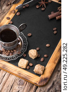 Coffee mug in the oriental style. Vintage set with cup of coffee on saucer in oriental style. Стоковое фото, агентство Ingram Publishing / Фотобанк Лори