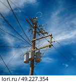 blur  in  philippines   a electric pole with transformer and wire  the cloudy sky. Стоковое фото, агентство Ingram Publishing / Фотобанк Лори