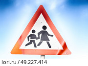 crosswalk sign  simbol isolated  in the sky warning concept. Стоковое фото, агентство Ingram Publishing / Фотобанк Лори
