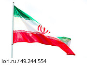 in iran blur  iranian waving flag  the blue sky and wind. Стоковое фото, агентство Ingram Publishing / Фотобанк Лори