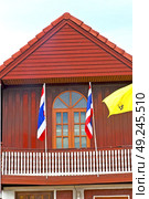 temple   in  bangkok thailand incision red venetian blind and terrace waving flag . Стоковое фото, агентство Ingram Publishing / Фотобанк Лори