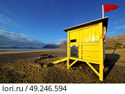 water lifeguard chair cabin red flag in spain  lanzarote  rock stone sky cloud beach  musk pond  coastline and summer . Стоковое фото, агентство Ingram Publishing / Фотобанк Лори