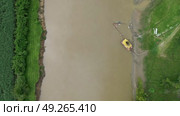 Heavy Machinery Dredging the Cauca River. Стоковое видео, видеограф ALEJANDRO PEREZ ALVARES / Фотобанк Лори