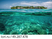 A small island surrounded by vast ocean waters, isolated and untouched by human presence. Стоковое AI-изображение, AI-художник Данила Большаков / Фотобанк Лори
