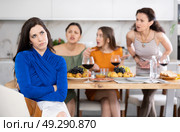 Portrait of an upset brunette woman who quarreled with her friends at party. Стоковое фото, фотограф Яков Филимонов / Фотобанк Лори