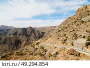  gorge and canyon the deep cloudy sky   in oman the old  mountain . Стоковое фото, агентство Ingram Publishing / Фотобанк Лори