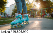 Skating on a sunny day in the park with vibrant blue rollerblades and an active atmosphere. Стоковое AI-изображение, AI-художник Сергей Толмачёв / Фотобанк Лори